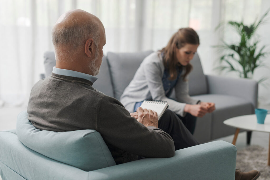 Woman talks to therapist about the purpose of detox