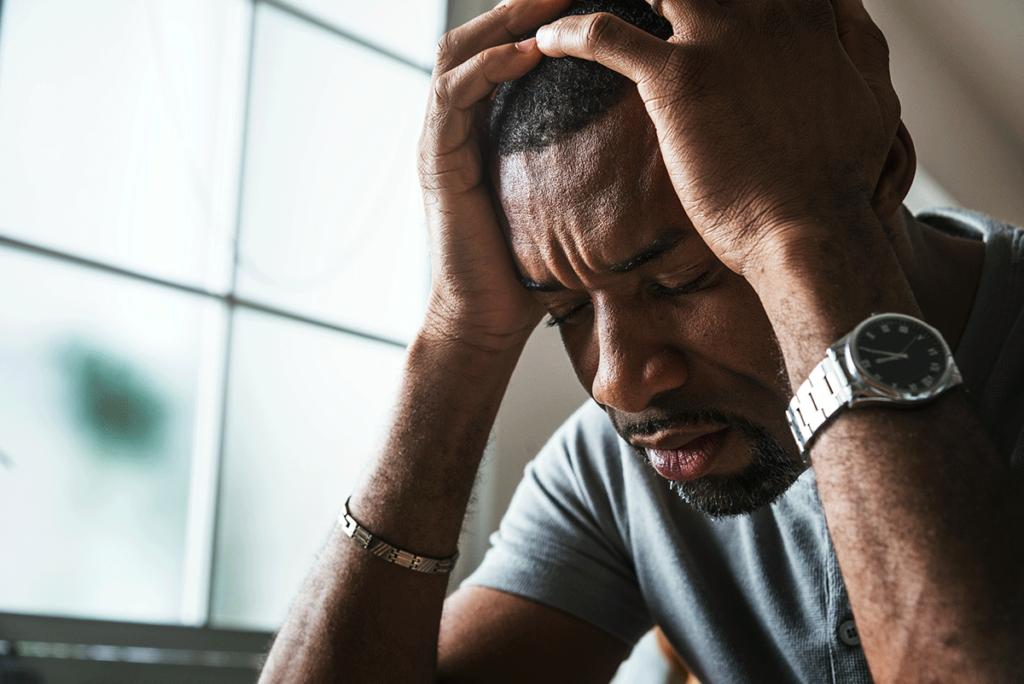Person feeling alcohol withdrawal symptoms