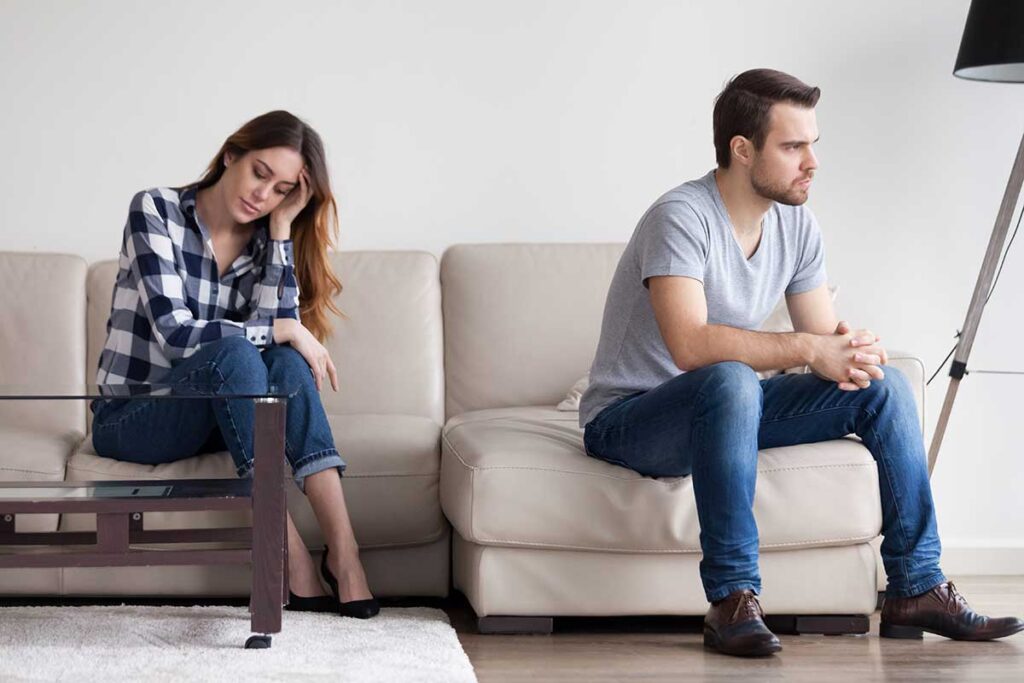 Two people thinking about the link between using alcohol and relationship issues