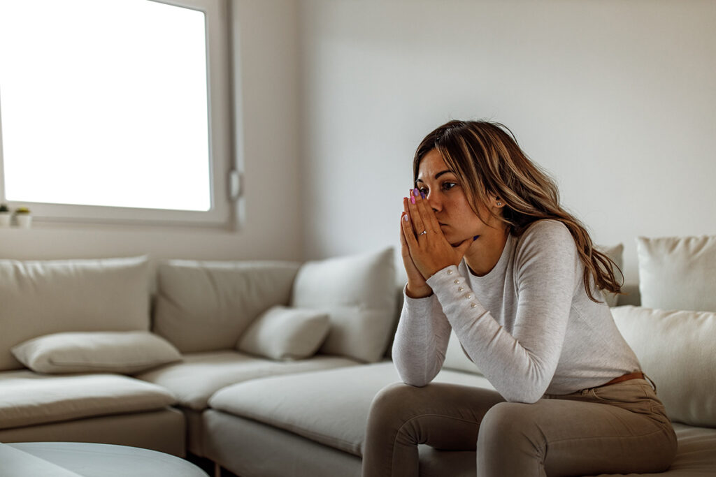 Person thinking about the link between alcohol and anxiety