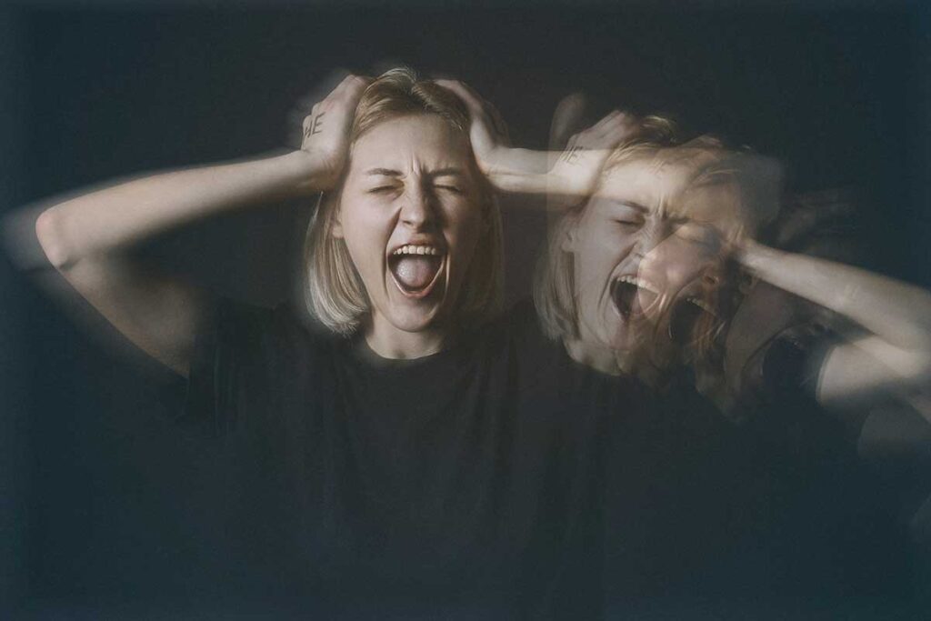 Person struggling with PTSD and bipolar disorder